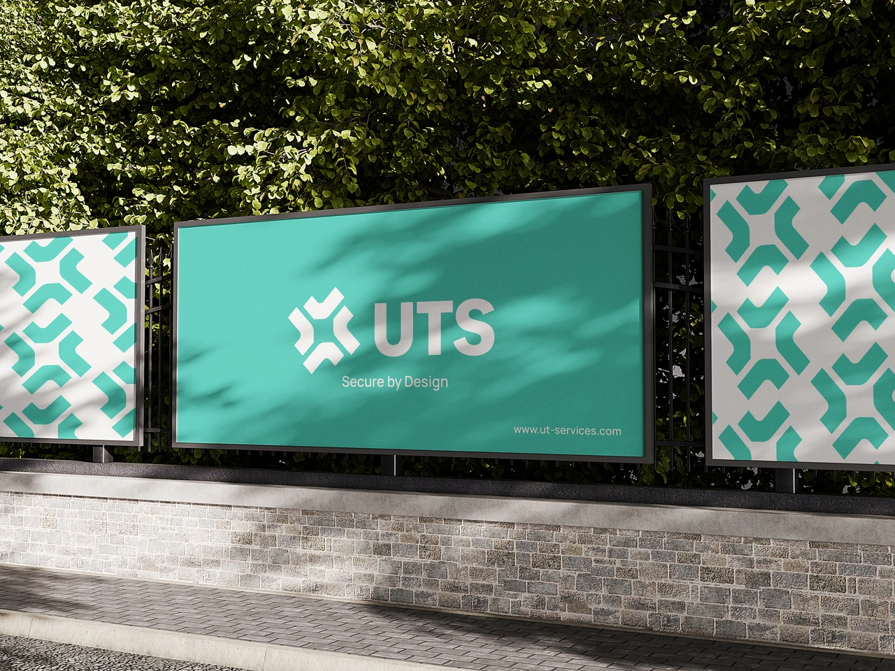 UTS Design and Branding Agency outdoor billboard mockup displaying custom logo and tagline by Design Noon