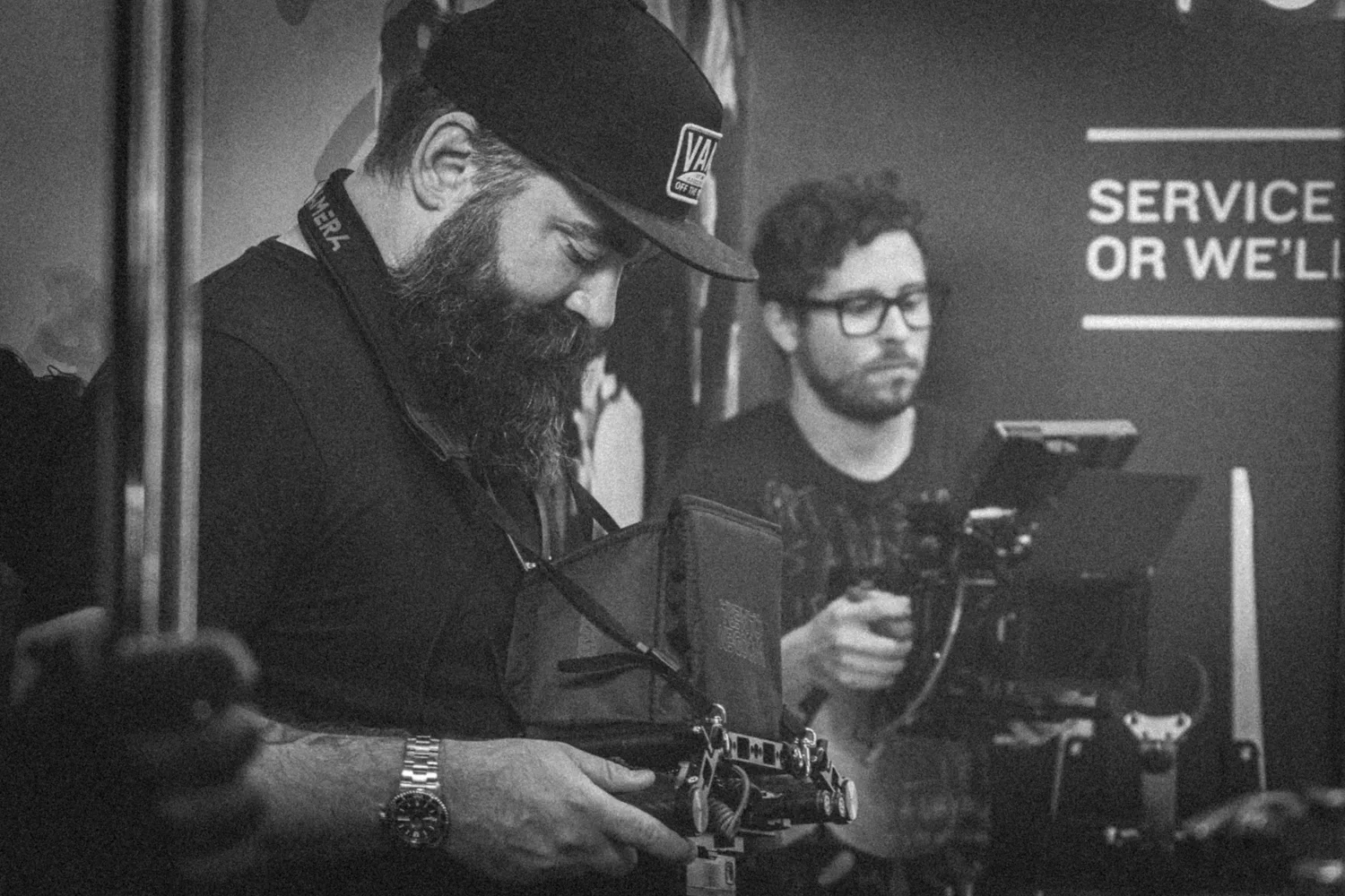 Washington DC creative agency news & insights - Design Noon video production crew managing cameras and monitors behind the scenes